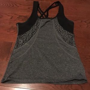 Gray and black workout top with cutouts